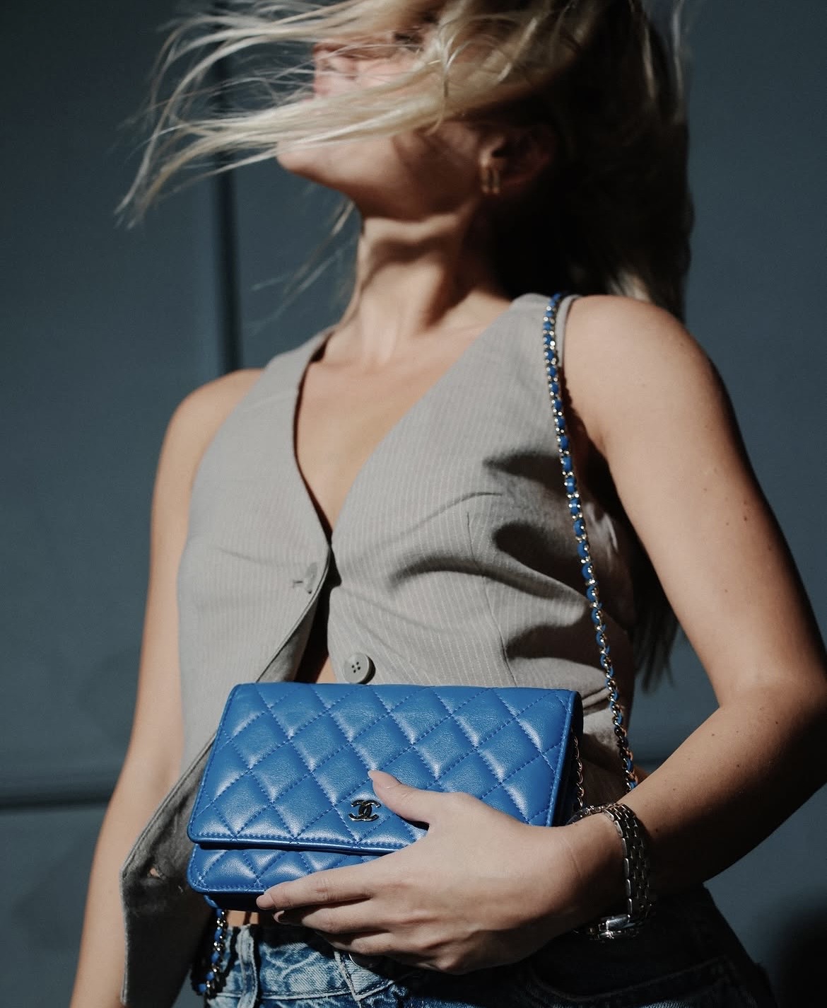 Fashion portrait with blue Chanel bag