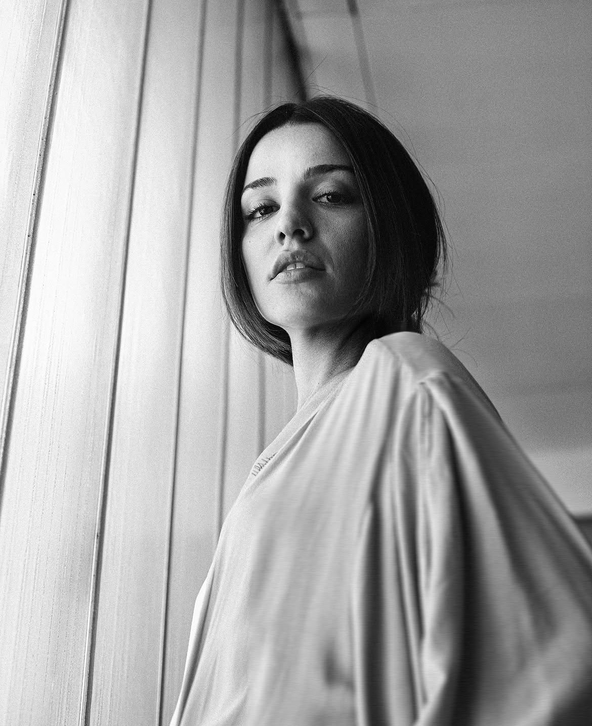 Black-and-white brunette with draped fabric