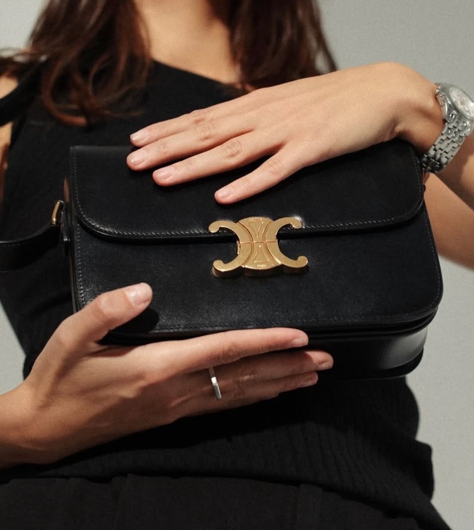 Close-up fashion portrait with black Celine bag