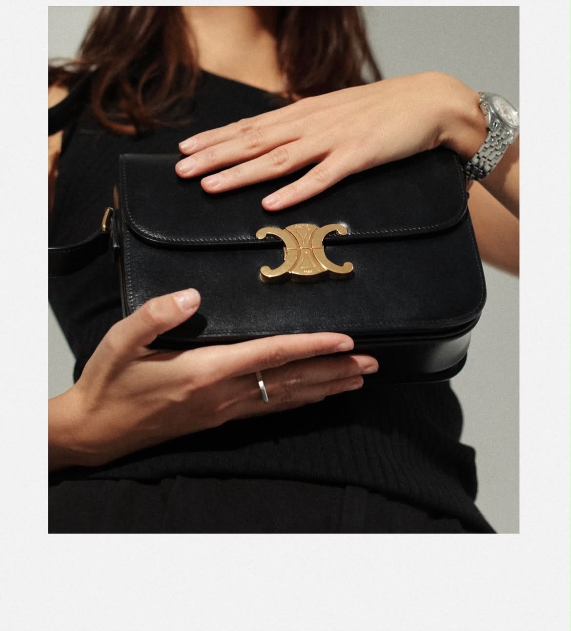 Close-up fashion portrait with black Celine bag